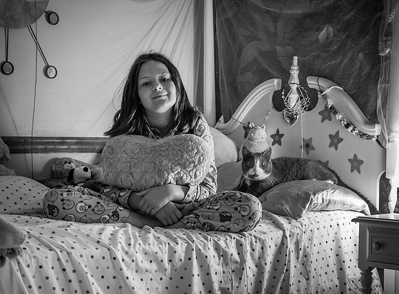 A Girl, Her Room, and Her Cat